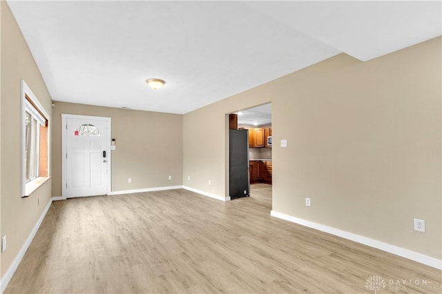 interior space with light hardwood / wood-style flooring