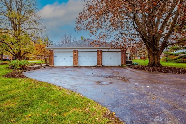 garage with a lawn