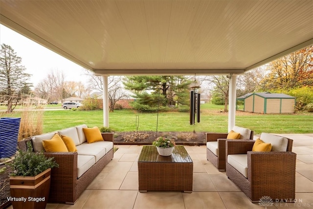 view of patio with outdoor lounge area and a storage unit