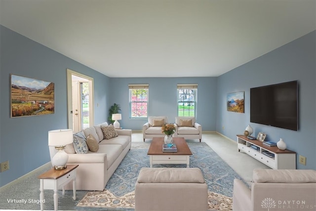 living room with light colored carpet