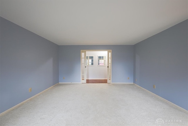 empty room featuring carpet floors