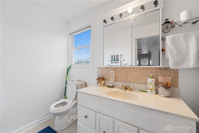 bathroom featuring tile patterned flooring, vanity, backsplash, and toilet