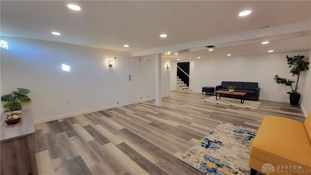 basement featuring hardwood / wood-style flooring