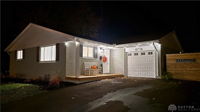 view of front of property featuring a garage