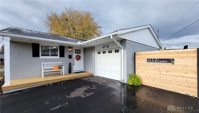 single story home with a garage