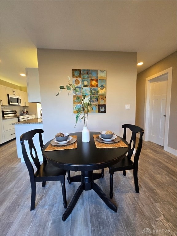 dining room featuring hardwood / wood-style floors