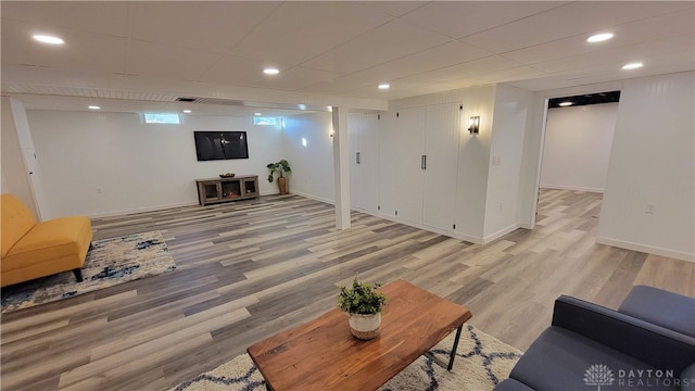 living room with light hardwood / wood-style floors