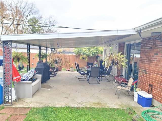 view of patio / terrace with a grill