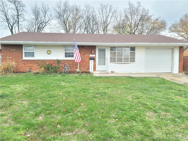 single story home featuring a garage and a front yard