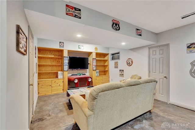 living room featuring concrete flooring