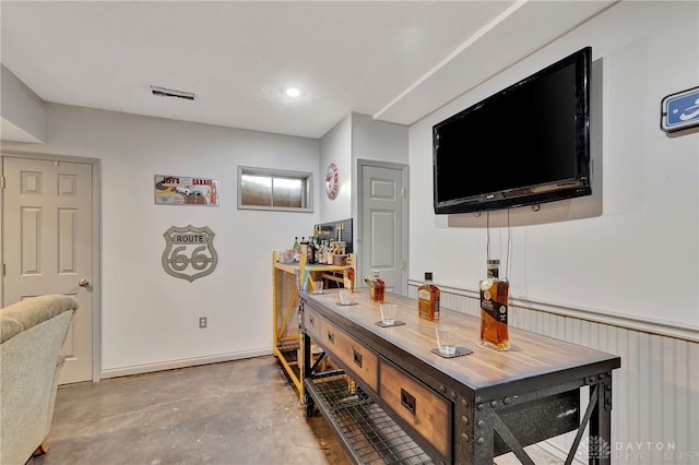 office space featuring concrete floors