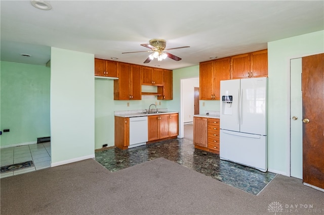 kitchen with ceiling fan, sink, and white appliances