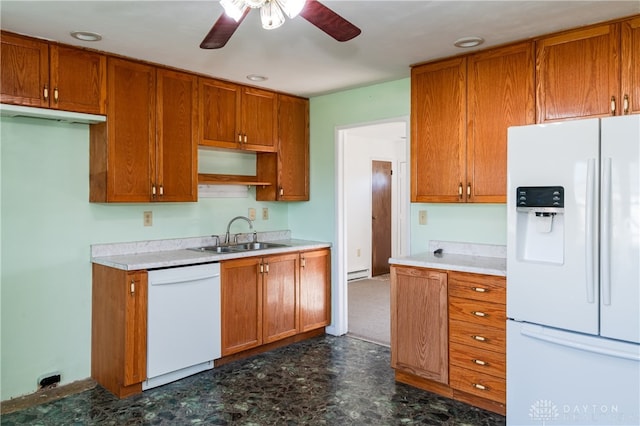 kitchen with white appliances, a baseboard radiator, ceiling fan, and sink