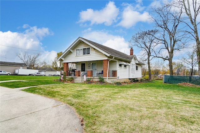 view of front facade with a porch and a front yard