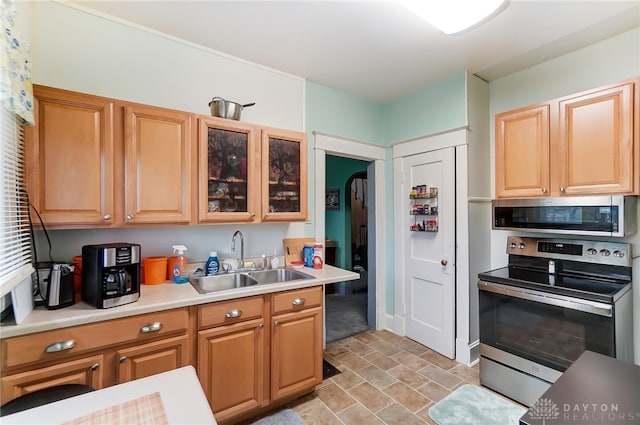 kitchen with sink and stainless steel appliances