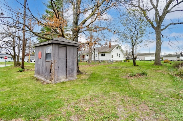 view of yard with a storage shed