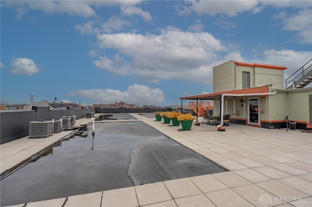 view of patio / terrace with central AC unit