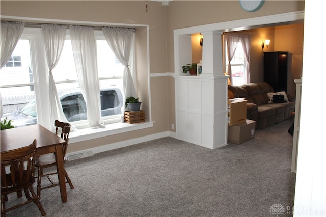 view of carpeted dining space