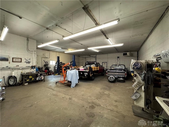 garage with a workshop area