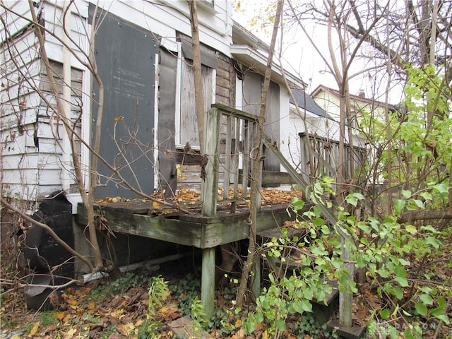 view of side of property with a deck