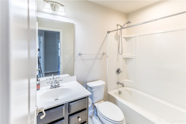 full bathroom with vanity, toilet, and shower / washtub combination