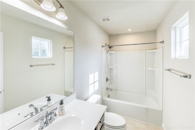 full bathroom with tile patterned floors, vanity, toilet, and shower / tub combination