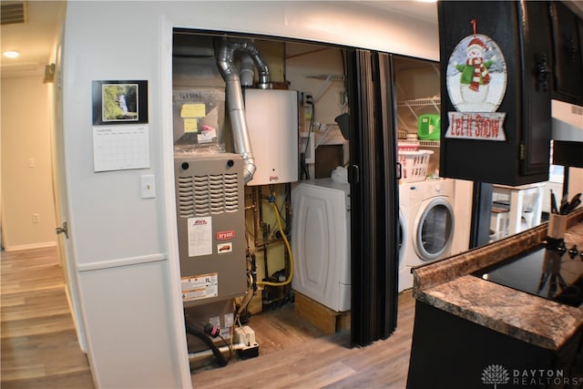 utility room with tankless water heater