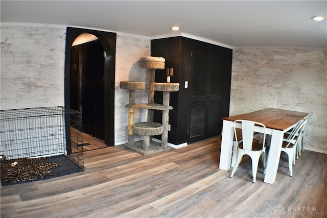 dining area with wood-type flooring