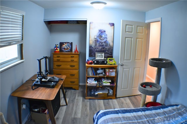 bedroom featuring hardwood / wood-style flooring