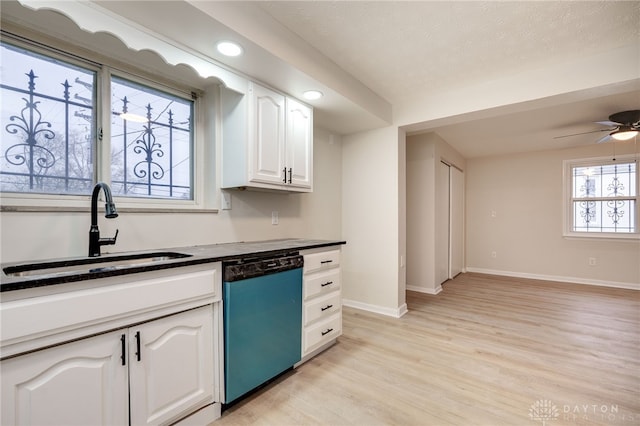 kitchen with white cabinetry, dishwasher, light wood-type flooring, and sink