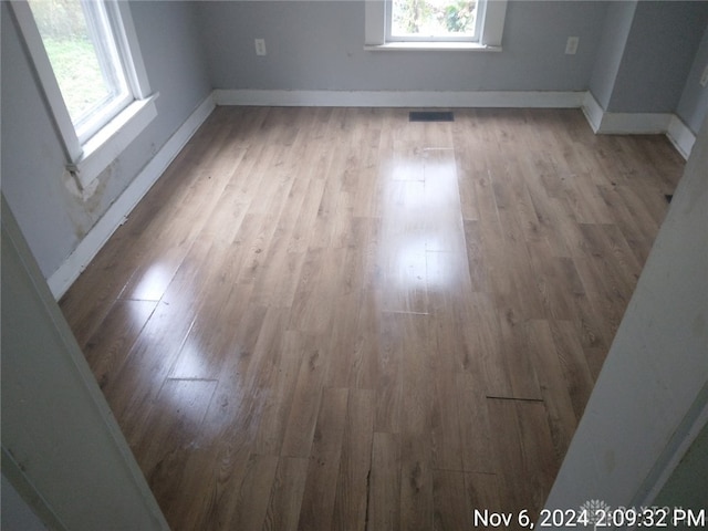 spare room with light wood-type flooring