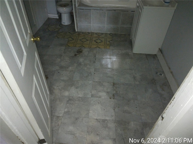 bathroom with tile patterned floors and toilet