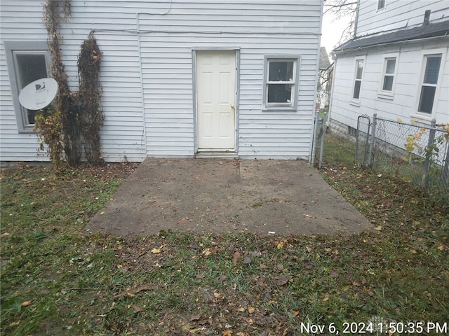 doorway to property with a patio area