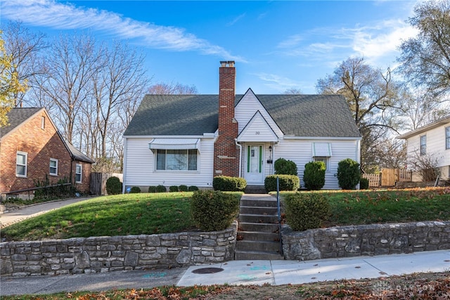 view of front of home with a front yard