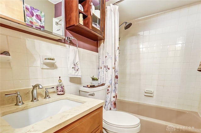 full bathroom featuring tasteful backsplash, vanity, shower / bath combination with curtain, and toilet