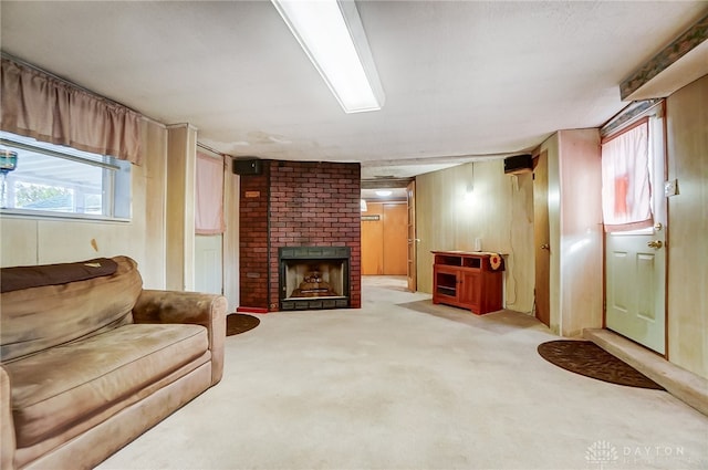 living room featuring carpet flooring and a fireplace