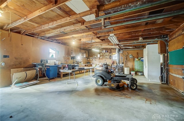 garage with a workshop area