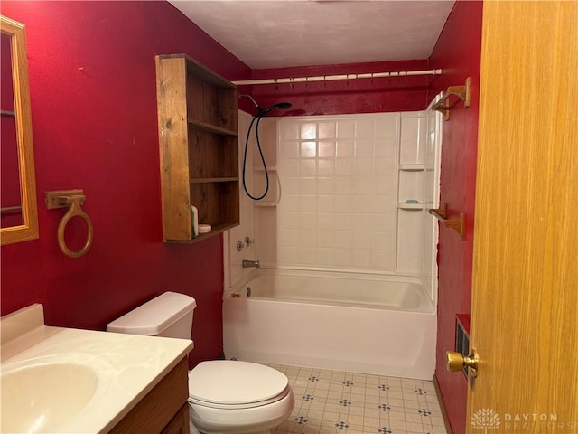 full bathroom featuring vanity, tub / shower combination, and toilet