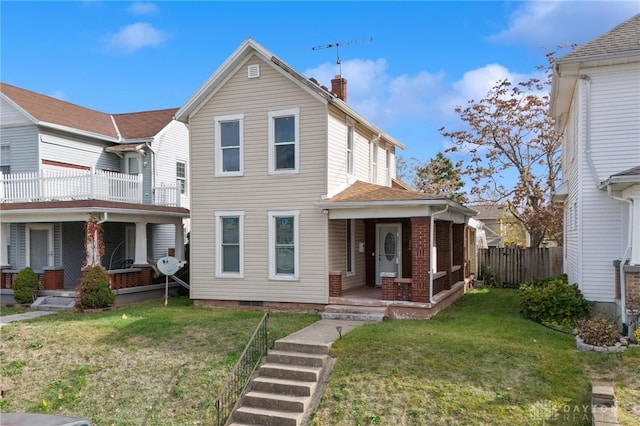 view of front of property featuring a porch and a front yard