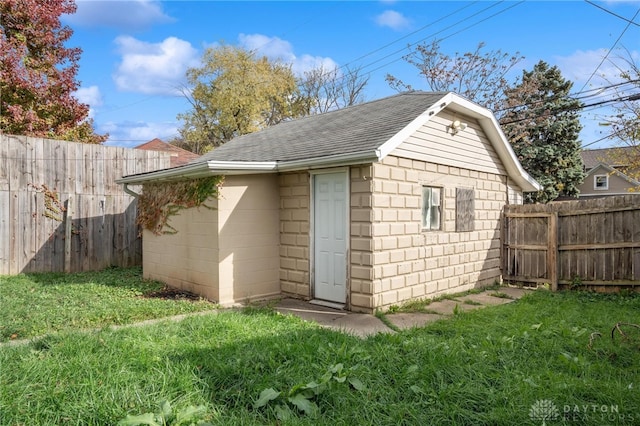 view of outdoor structure with a yard