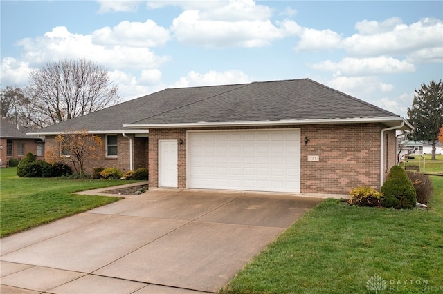 ranch-style home with a front lawn and a garage