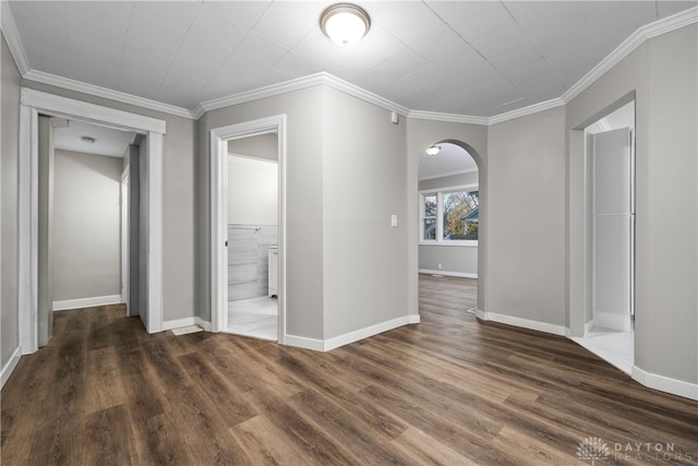 interior space with ornamental molding and dark wood-type flooring