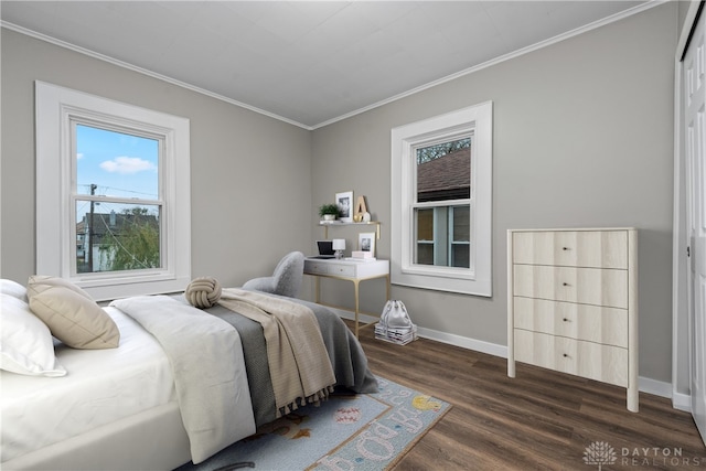 bedroom with dark wood-type flooring and ornamental molding