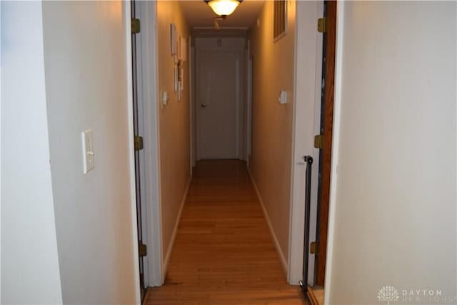 corridor featuring light wood-type flooring