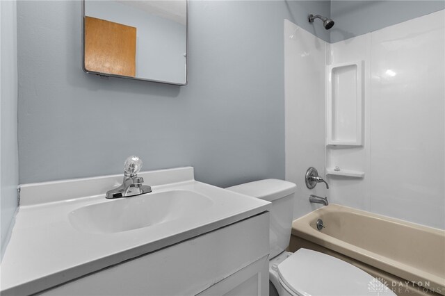 full bathroom with vanity, shower / bathing tub combination, and toilet