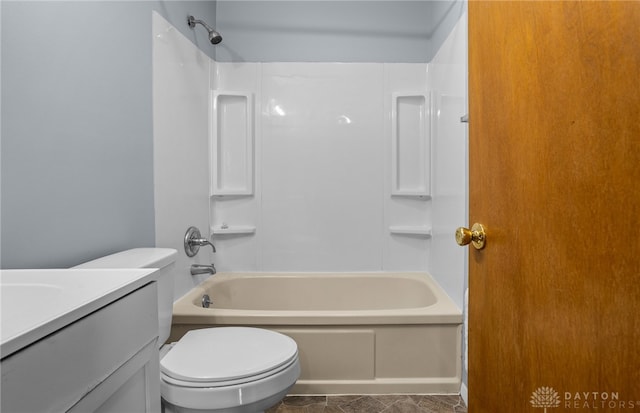 full bathroom with toilet, vanity, and washtub / shower combination