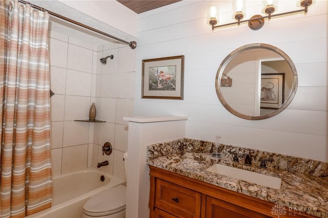 full bathroom featuring vanity, toilet, shower / bath combo with shower curtain, and wooden walls