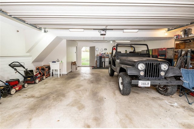 garage featuring a garage door opener