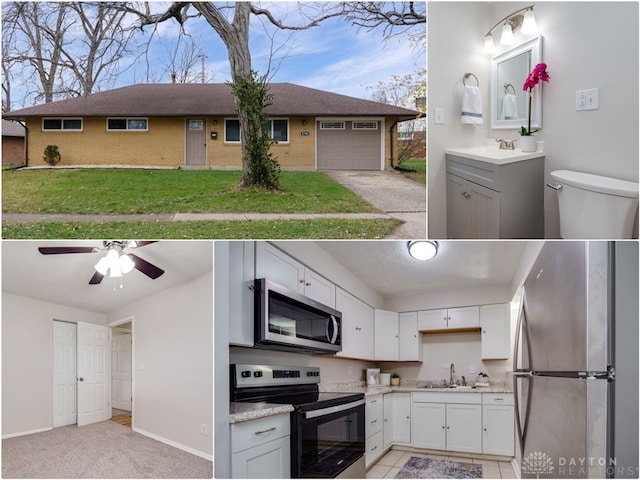 kitchen featuring light carpet, sink, white cabinets, and appliances with stainless steel finishes