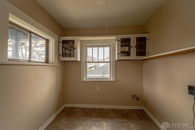 clothes washing area with plenty of natural light